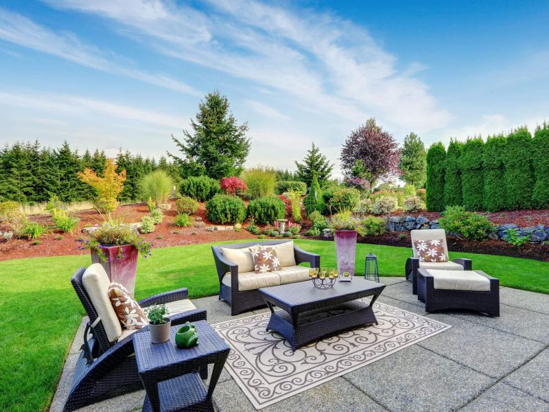 impressive-backyard-landscape-design-with-patio-area-520757241-78c75eb4cb704c1b832e1d25f52124bb